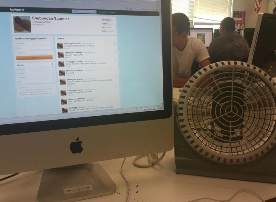 Asher Heimermann monitoring the scanner feed at South High School